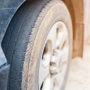 worn sidewall of car tyre 